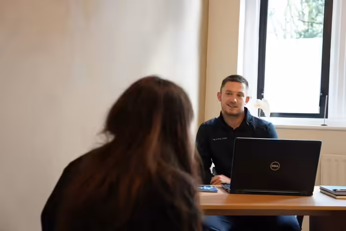 Therapist treating a patient at a Physio Lounge studio