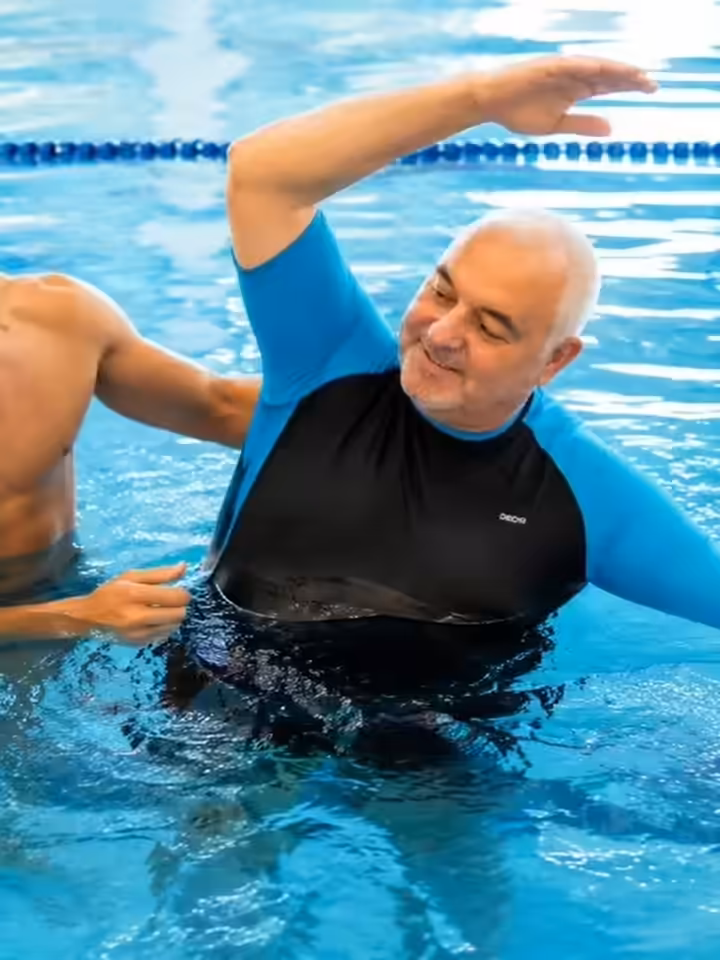 Hydrotherapy session in a warm-water rehabilitation pool
